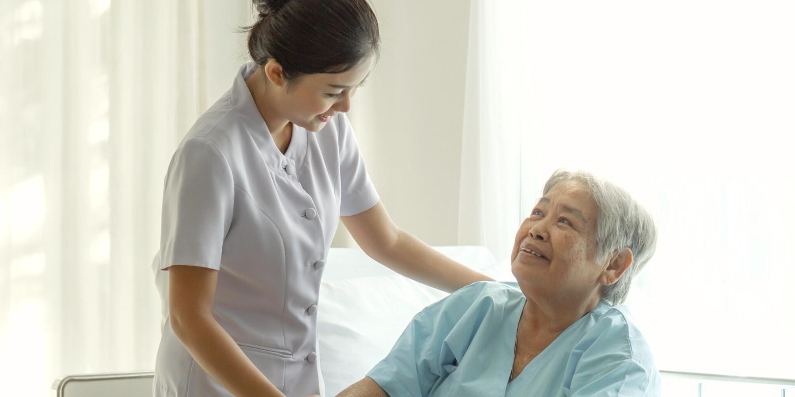 a nurse taking care a female patient